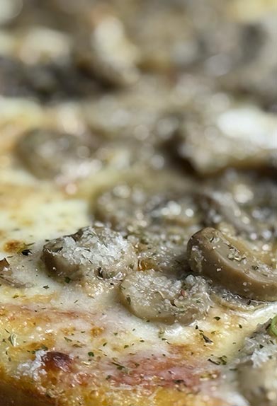 Baires pizzas piedrasblancas pizza champiñones